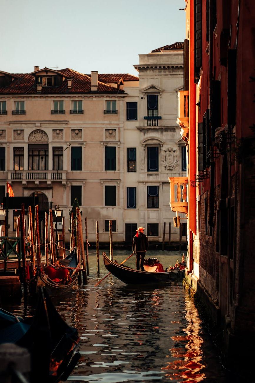 Colorful buildings along Venice canals at sunset
